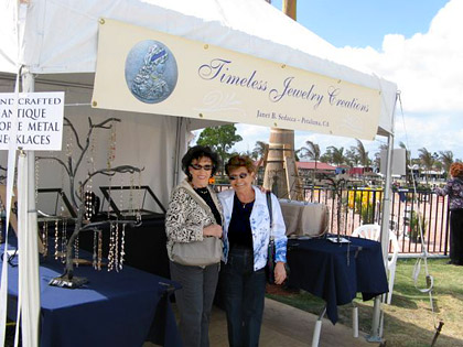 Booth shot with mom & her friend - WEF, Florida